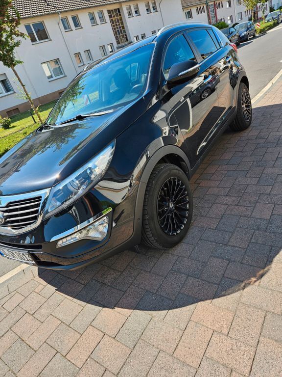Schwarz Gebraucht 2013 Kia Sportage DREAM-TEAM Edition SUV | 8.499 € (Guter Preis) - Bild 1/4