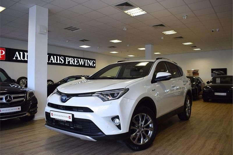 Weiß Gebraucht 2018 Toyota RAV4 Hybrid Executive SUV | 26.980 € (Etwas zu teuer) - Bild 1/4