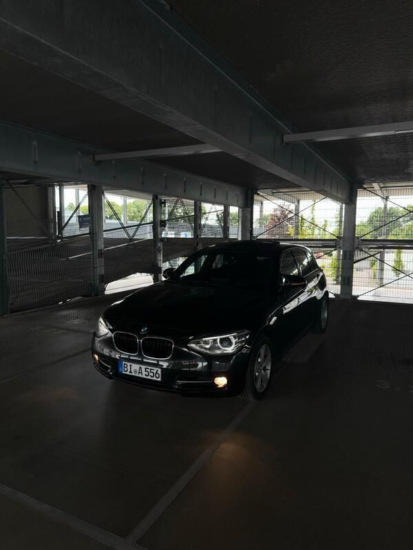 Schwarz Gebraucht 2013 BMW 120 Sport Line Kleinwagen | 10.990 € (Teuer) - Bild 1/4