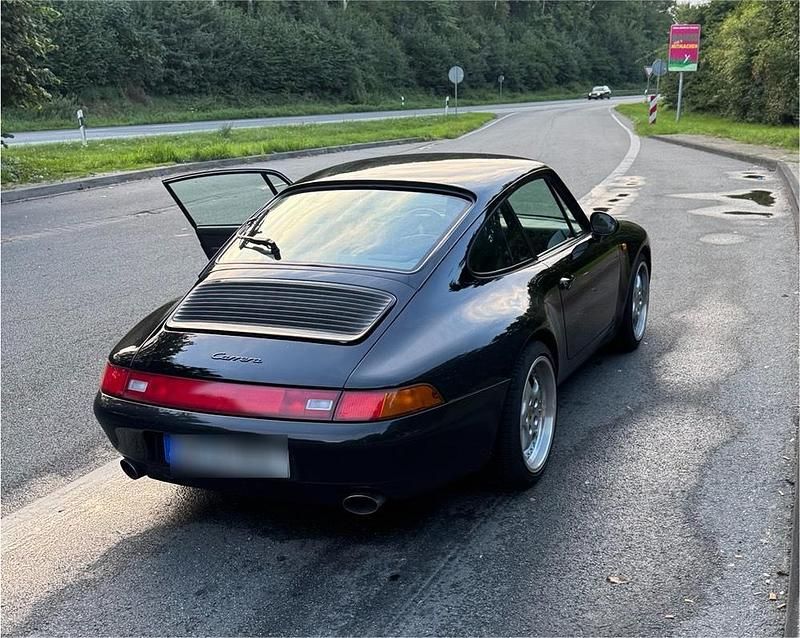 Schwarz Gebraucht 1994 Porsche 993 Coupé | 74.488 € - Bild 1/4