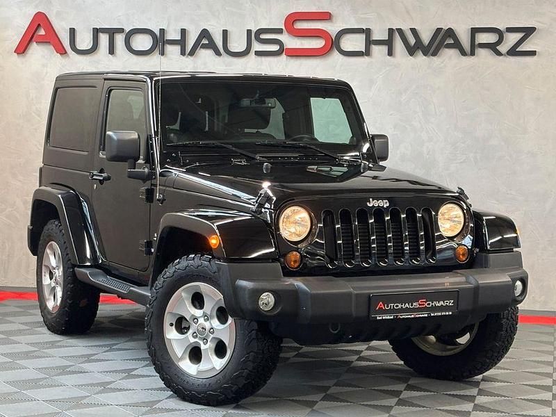 Schwarz Gebraucht 2013 Jeep Wrangler Sahara SUV | 30.990 € (Fairer Preis) - Bild 1/4