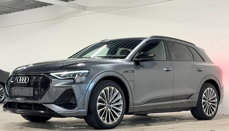 Grau Gebraucht 2020 Audi e-tron S-Line SUV | 28.435 € (Superpreis) - Bild 1/4