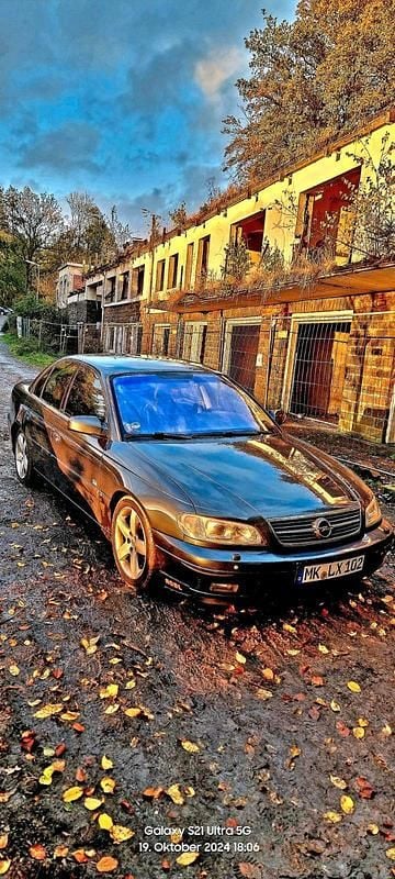 Grün Gebraucht 2001 Opel Omega Limousine | 2.220 € (Fairer Preis) - Bild 1/4
