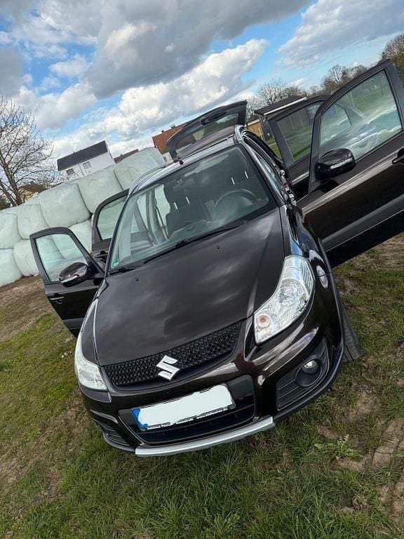 Gebraucht Suzuki SX4 120 PS (88 kW) 2013 Braun Limousine