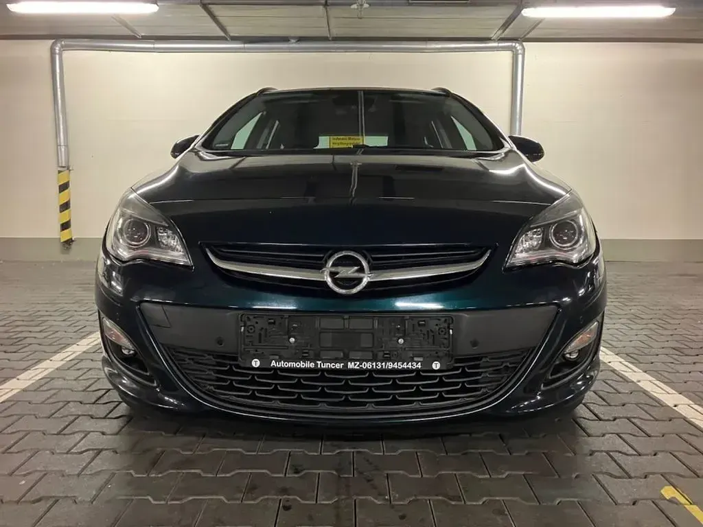 Gebraucht Opel Astra Edition 165 PS (121 kW) 2015 Grün Kombi