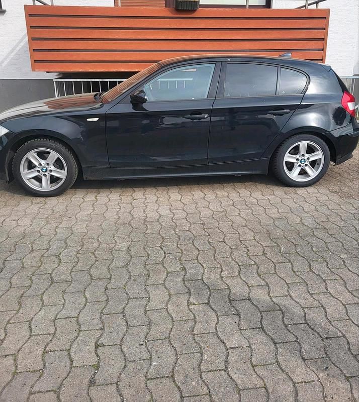 Second-hand BMW 116 122 CP (89 kW) 2007 Negru Hatchback