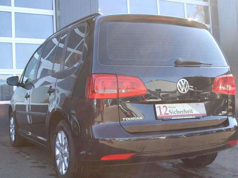 Gebraucht VW Touran Trendline 105 PS (77 kW) 2011 Schwarz Van / Kleinbus