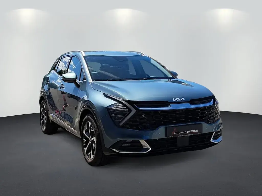 Gebraucht Kia Sportage 179 PS (131 kW) 2023 Yukagrau met. SUV