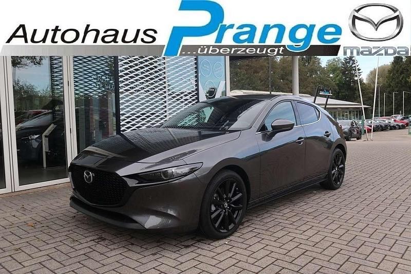 Machine gray Neu 2024 Mazda 3 Exclusive-Line Limousine | 30.985 € (Fairer Preis) - Bild 1/4
