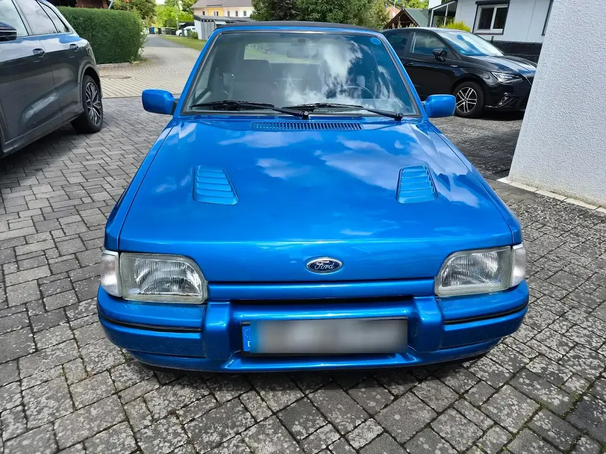 Gebraucht Ford Escort Cabriolet 102 PS (75 kW) 1990 Blau Cabrio