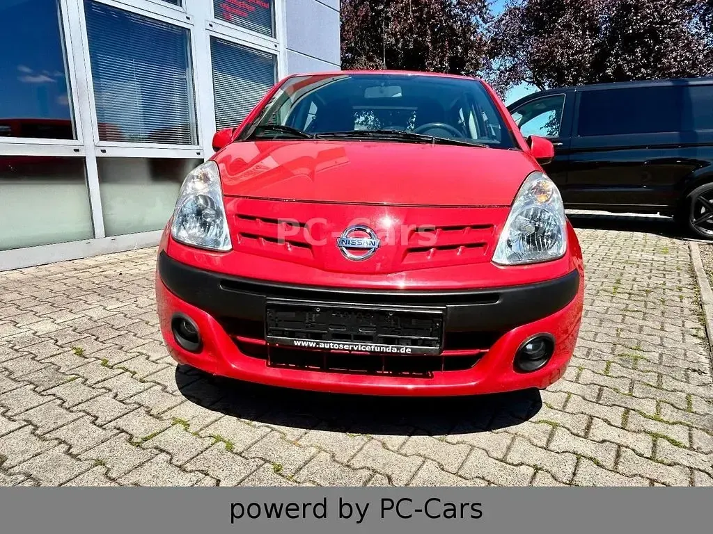 Gebraucht Nissan Pixo Acenta 68 PS (50 kW) 2009 Rot Kleinwagen