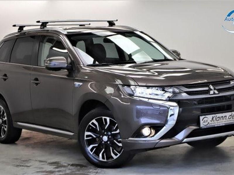 Granitbraun Gebraucht 2016 Mitsubishi Outlander Top SUV | 27.499 € - Bild 1/4