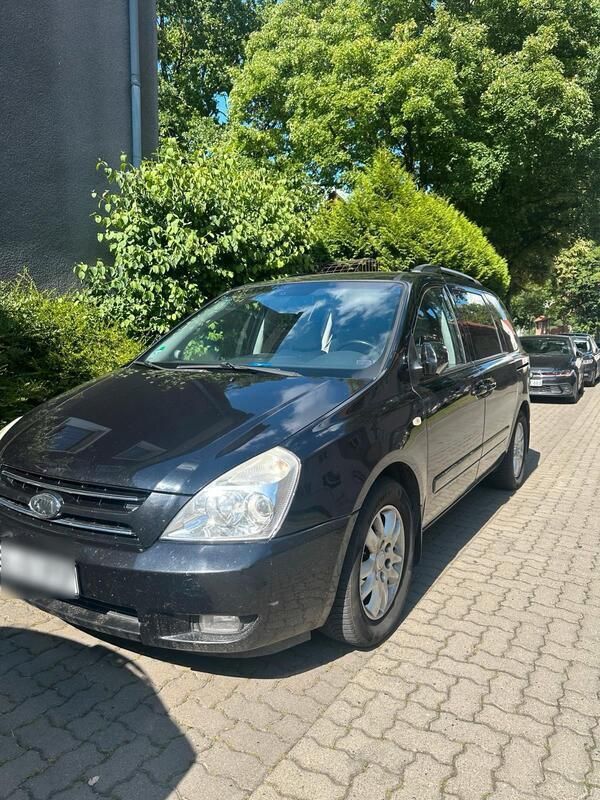 Schwarz Gebraucht 2009 Kia Carnival Van / Kleinbus | 2.899 € (Fairer Preis) - Bild 1/4