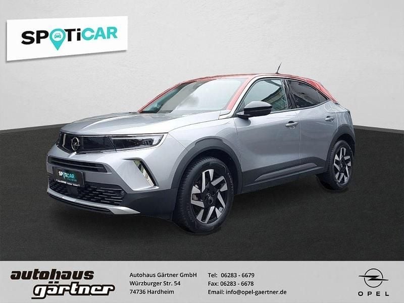 Gebraucht Opel Mokka-e Elegance 100 kW (136 PS) 2022 Kontrast grau/quarz silber SUV