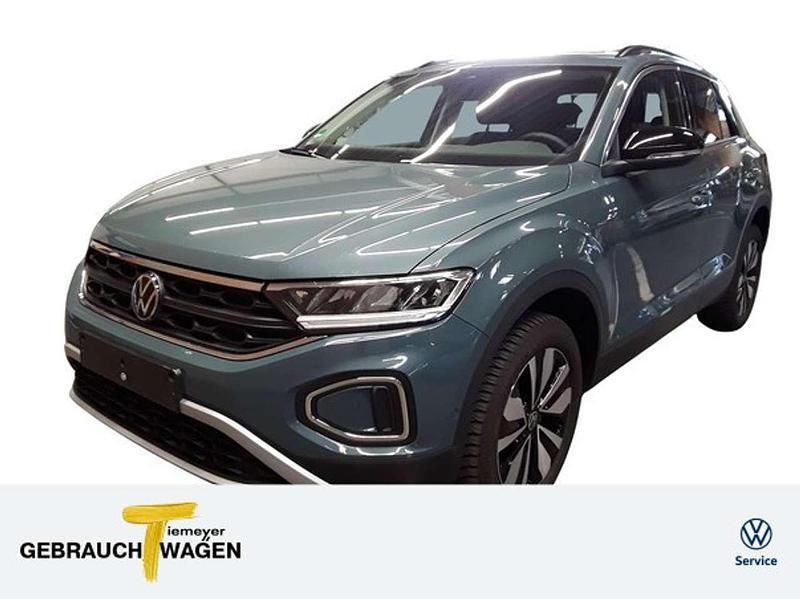 Petroleum blue metallic Gebraucht 2024 VW T-Roc Life SUV | 28.740 € (Superpreis) - Bild 1/4