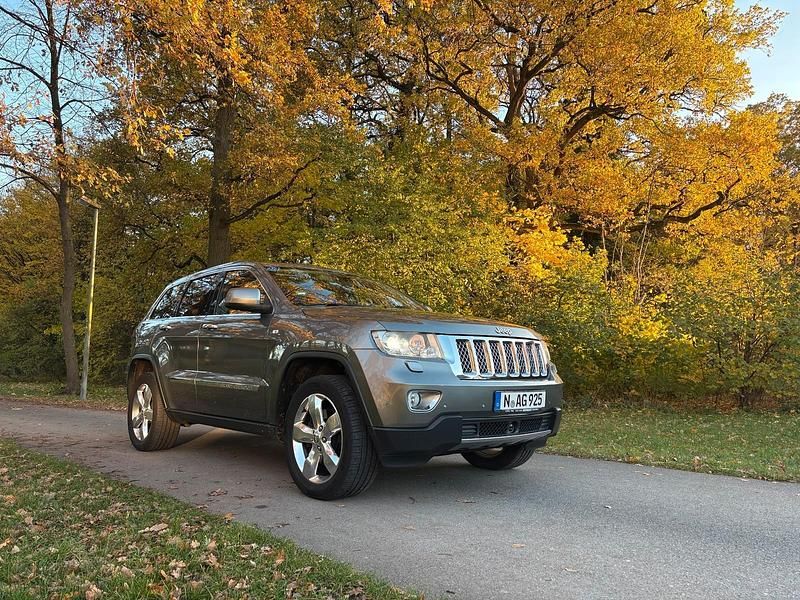 Andere farben Gebraucht 2012 Jeep Grand Cherokee Summit SUV | 9.900 € (Fairer Preis) - Bild 1/4