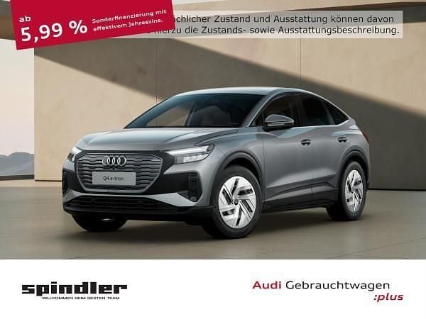 Grau (taifungrau metallic) Gebraucht 2021 Audi Q4 Sportback e-tron Basis SUV | 24.981 € (Teuer) - Bild 1/4
