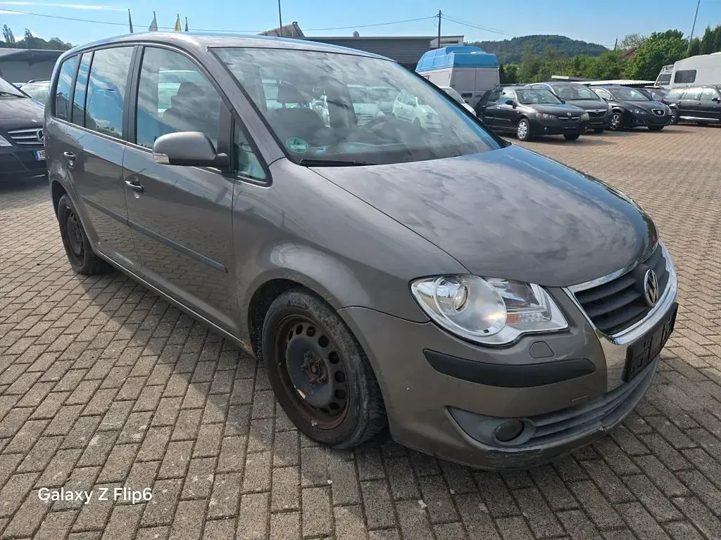 Używany VW Touran Conceptline 90 KM (66 kW) 2007 Brązowy Minivan