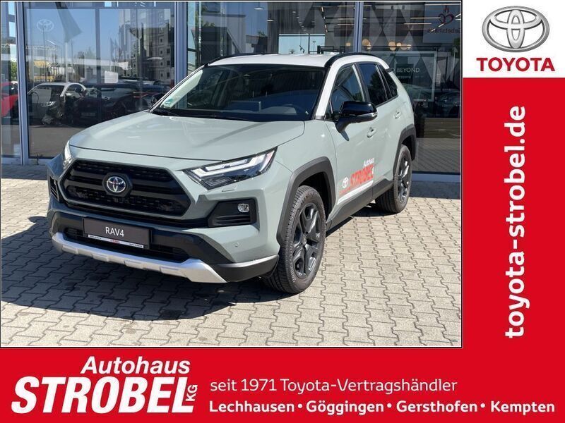 Urbankhaki / dach dynamic grey Gebraucht 2023 Toyota RAV4 Hybrid SUV | 46.880 € (Teuer) - Bild 1/4