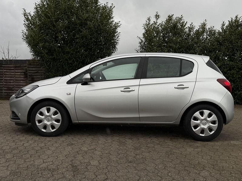 Używany Opel Corsa Edition 75 KM (55 kW) 2015 Srebrny Hatchback