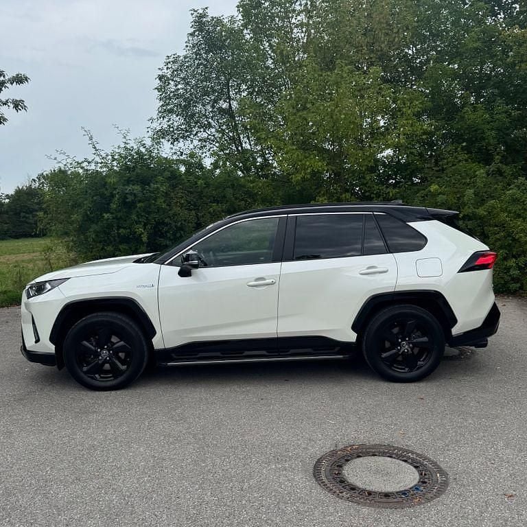 Weiß Gebraucht 2019 Toyota RAV4 Hybrid Style SUV | 28.500 € (Fairer Preis) - Bild 1/4