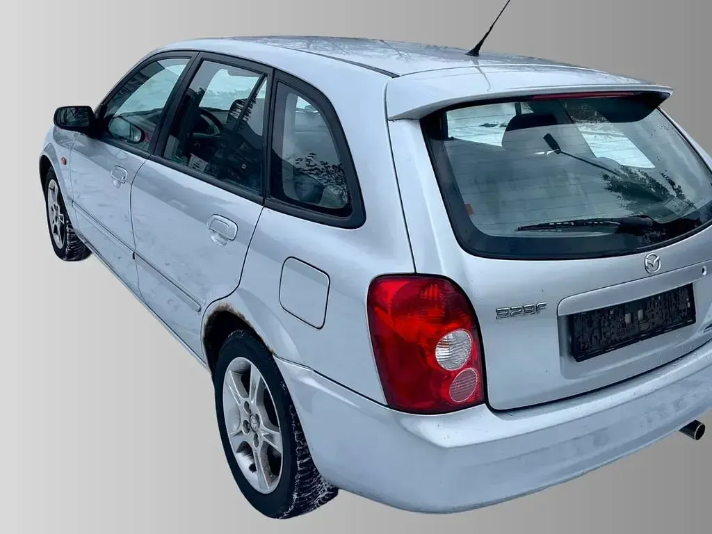 Gebraucht Mazda 323 98 PS (72 kW) 2002 Silber Limousine