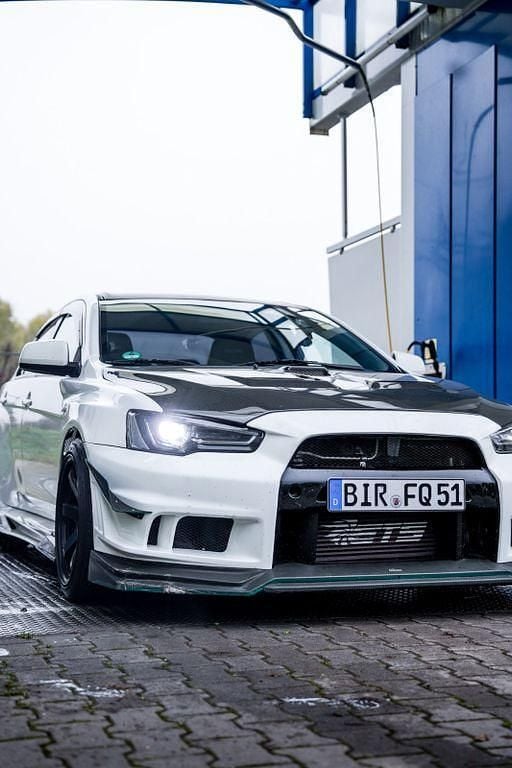 Weiß Gebraucht 2013 Mitsubishi Lancer Limousine | 24.000 € - Bild 1/4