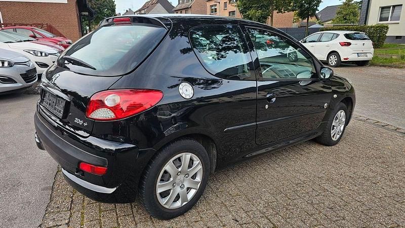 Gebraucht Peugeot 206+ 73 PS (53 kW) 2012 Lackierung schwarz perla nera/ Kleinwagen