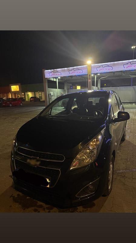 Gebraucht Chevrolet Spark 69 PS (50 kW) 2013 Schwarz Kleinwagen