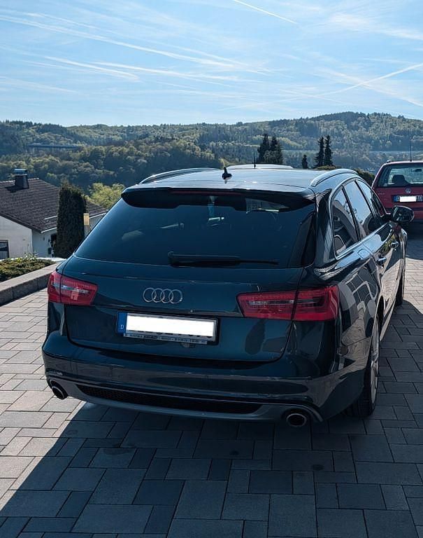 Second-hand Audi A6 Sport 245 CP (180 kW) 2013 Albastru Break