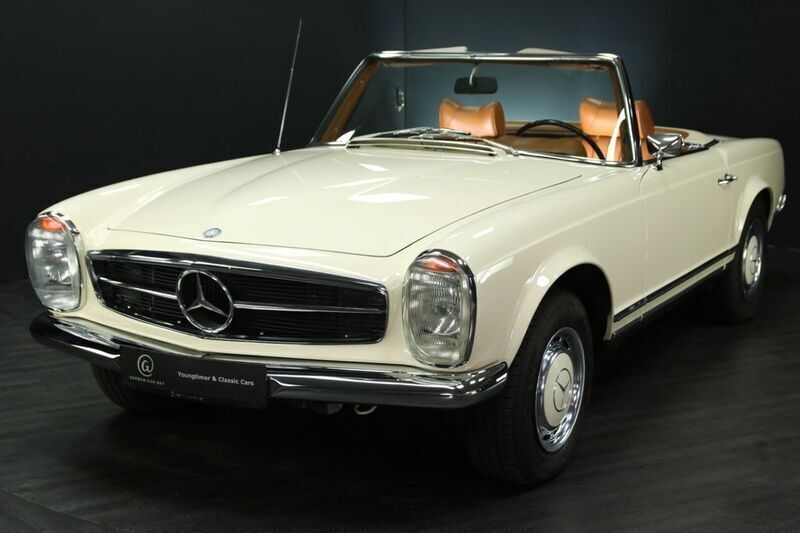 Hellelfenbein 670 & schwarz 04 Gebraucht 1971 Mercedes SL280 Cabrio | 99.500 € - Bild 1/4