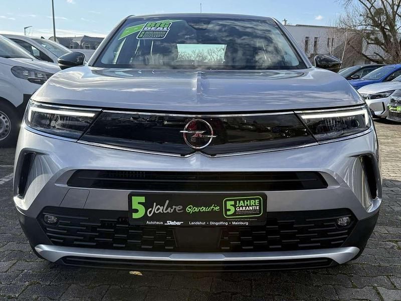 Gebraucht Opel Mokka Elegance 131 PS (96 kW) 2022 Kontrast grau/quarz silber SUV