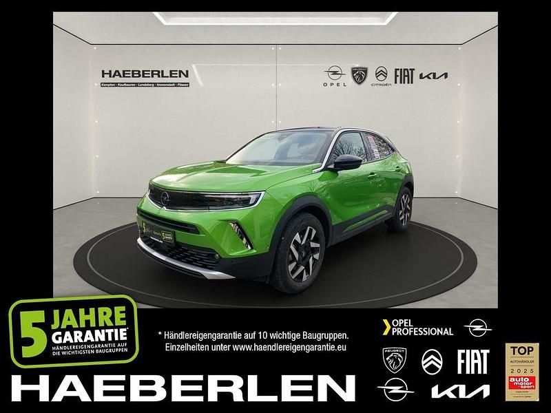 Grün (metallic) Gebraucht 2023 Opel Mokka-e Elegance SUV | 18.790 € (Guter Preis) - Bild 1/4
