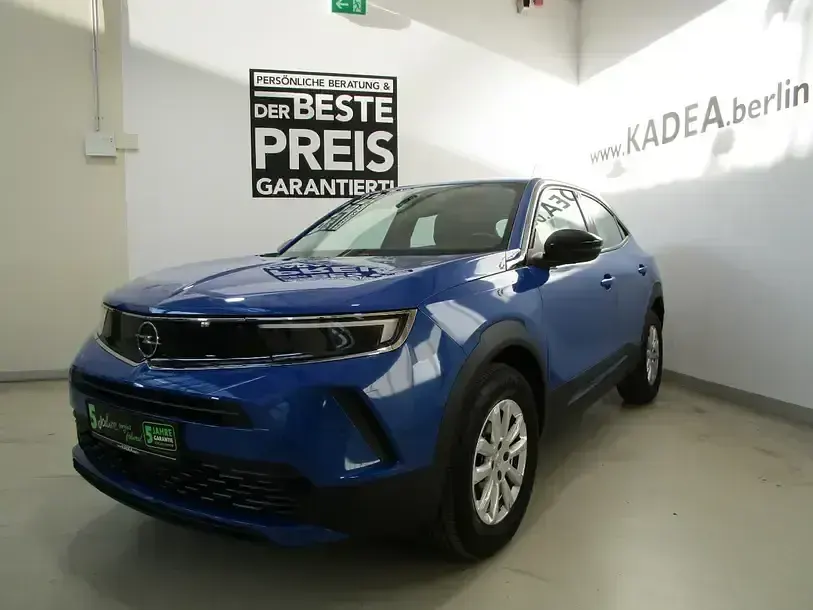 Gebraucht Opel Mokka 101 PS (74 kW) 2023 Perl blau/voltaik blau (metallic) SUV