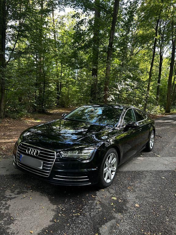 Schwarz Gebraucht 2014 Audi A7 Sportback Comfort Kleinwagen | 15.700 € (Fairer Preis) - Bild 1/4