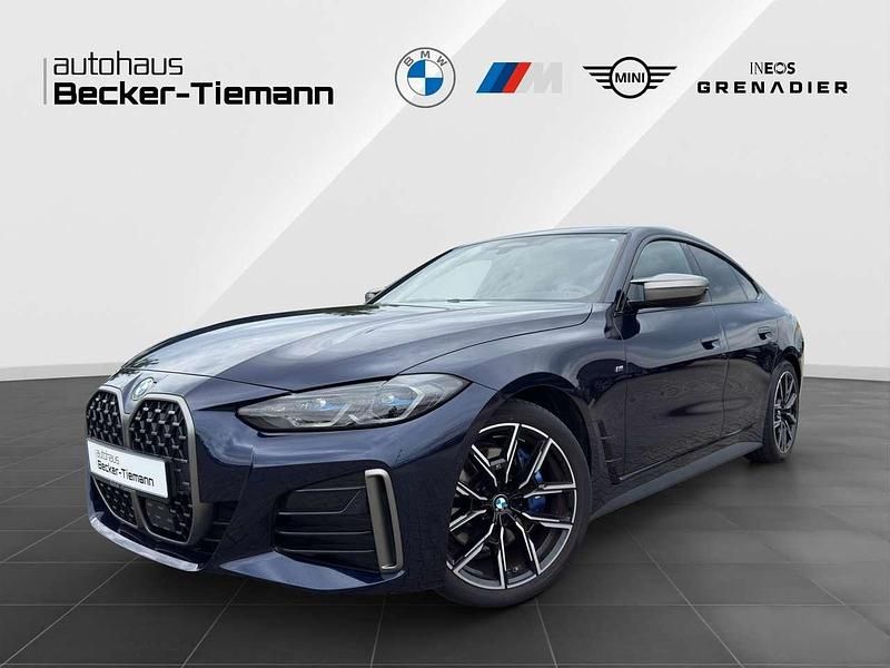 Bmw individual tansanitblau Gebraucht 2022 BMW M4 Coupé | 49.789 € (Superpreis) - Bild 1/4