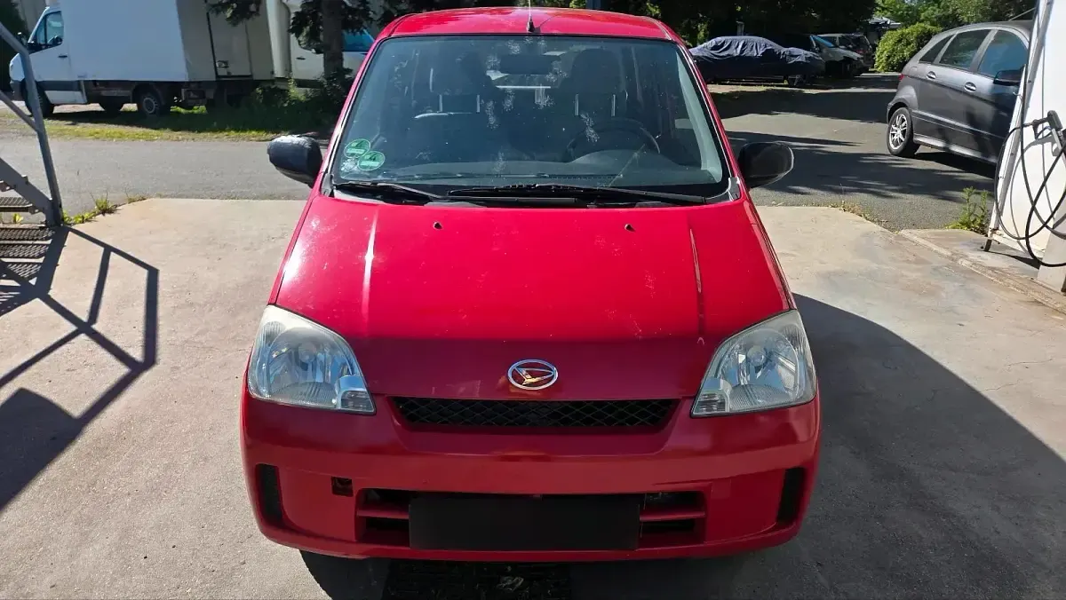 Gebraucht Daihatsu Cuore 58 PS (42 kW) 2003 Rot Kleinwagen