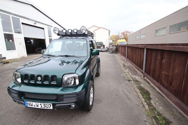 Grün Gebraucht 2006 Suzuki Jimny Comfort SUV | 12.500 € (Teuer) - Bild 1/4