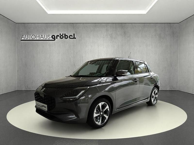 Mineral gray met. Gebraucht 2024 Suzuki Swift Comfort+ Kleinwagen | 18.490 € (Etwas zu teuer) - Bild 1/4