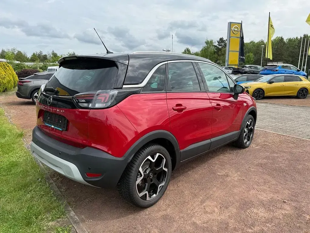 Gebraucht Opel Crossland Elegance 131 PS (96 kW) 2023 Chili rot/kardio rot SUV