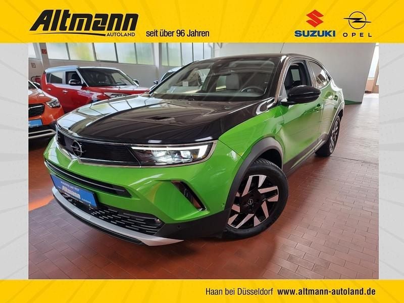 Matcha green/ikone gruen Gebraucht 2022 Opel Mokka Elegance SUV | 18.980 € (Guter Preis) - Bild 1/4