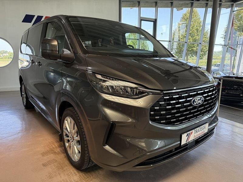Grau Gebraucht 2024 Ford Tourneo Custom Titanium Van / Kleinbus | 48.990 € (Teuer) - Bild 1/4