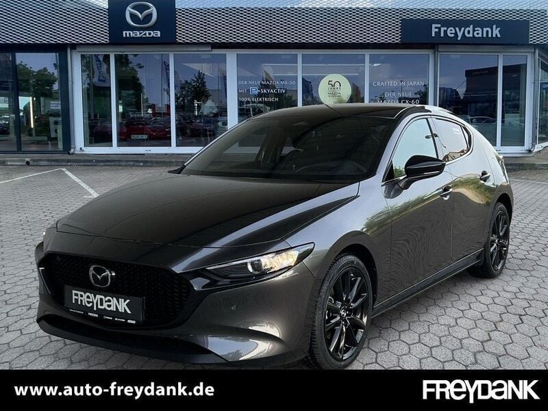 Machine gray Neu 2025 Mazda 3 Homura-Line | 25.990 € (Superpreis) - Bild 1/4