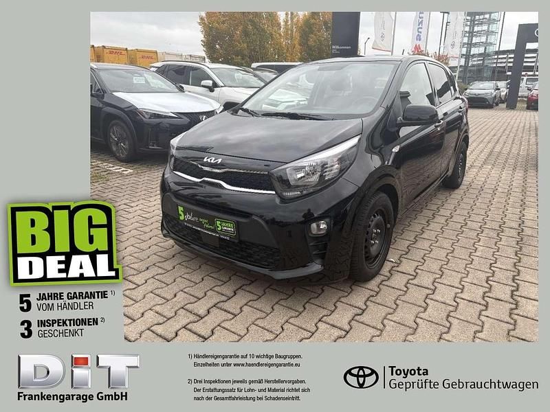 Auroraschwarz met. Gebraucht 2021 Kia Picanto DREAM-TEAM Edition Kleinwagen | 11.640 € (Fairer Preis) - Bild 1/4