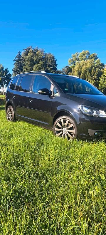 Schwarz Gebraucht 2012 VW Touran Van / Kleinbus | 12.999 € - Bild 1/4