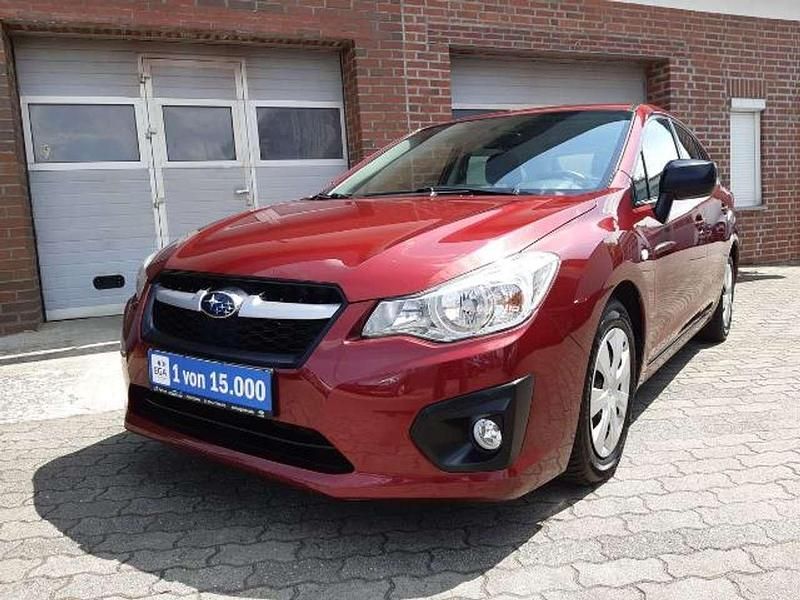 Gebraucht Subaru Impreza 114 PS (83 kW) 2013 Dunkelrot metallic Limousine
