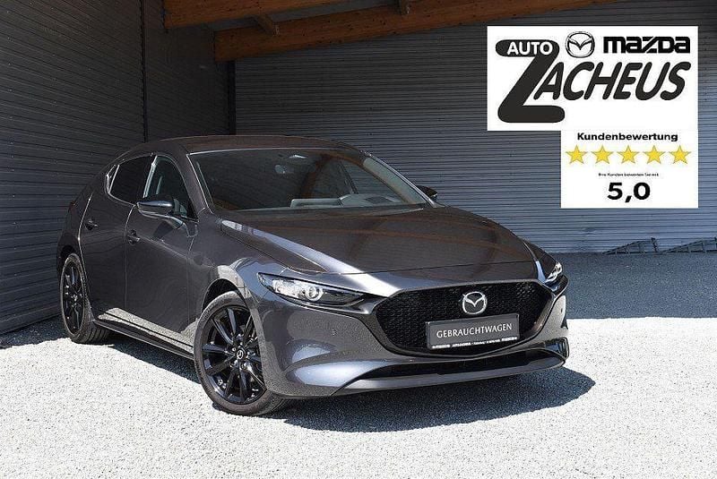 Machine gray Gebraucht 2023 Mazda 3 Homura-Line Limousine | 24.400 € (Guter Preis) - Bild 1/4