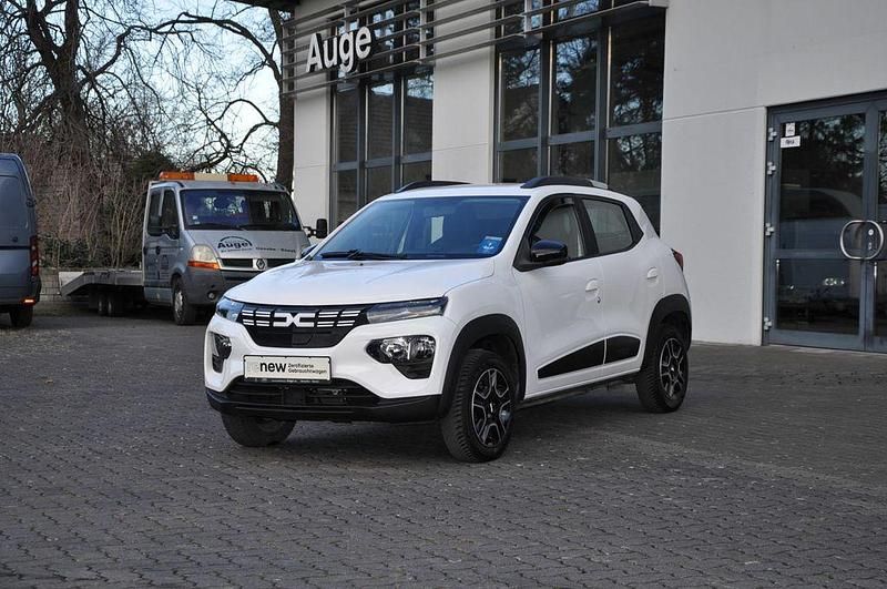 Kaolinweiß Gebraucht 2022 Dacia Spring Essentiel Kleinwagen | 14.500 € (Teuer) - Bild 1/4