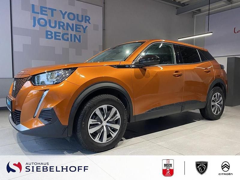Orange metallic Gebraucht 2022 Peugeot e-2008 Active SUV | 13.990 € (Superpreis) - Bild 1/4