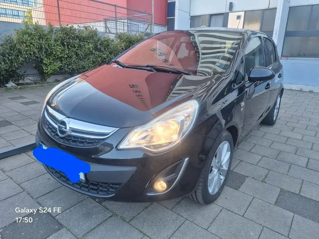 Gebraucht Opel Corsa Active 87 PS (63 kW) 2012 Schwarz Kleinwagen